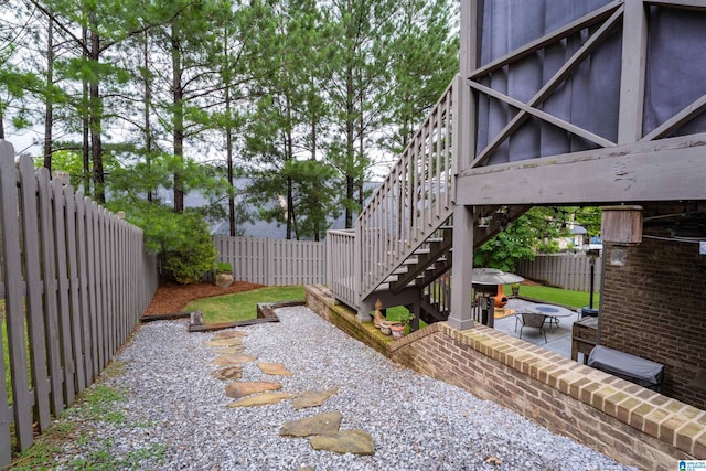 1221 Grants Way, Irondale, AL 35210 - fenced backyard featuring a patio area, an outdoor fire pit, and stairs