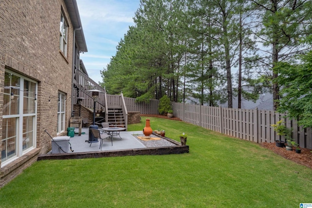 1221 Grants Way, Irondale, AL 35210 - fenced backyard with a patio and stairway