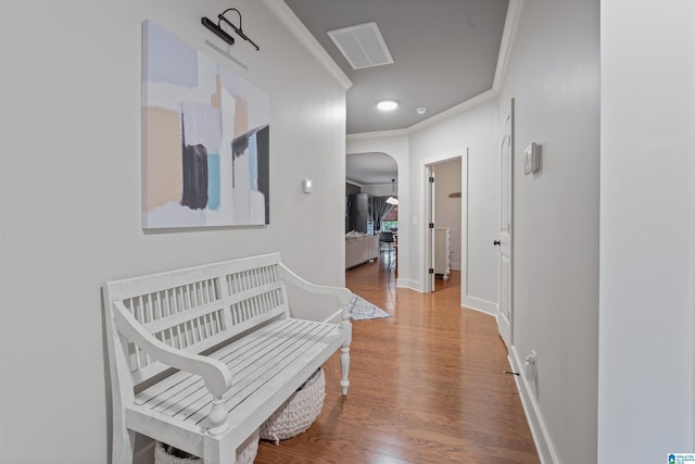 1221 Grants Way, Irondale, AL 35210 - hallway featuring wood finished floors, arched walkways, ornamental molding, and recessed lighting