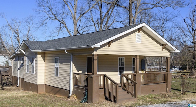 1330 14th Ave N, Bessemer, AL 35020 - view of front of house featuring a porch, a shingled roof, and stairway