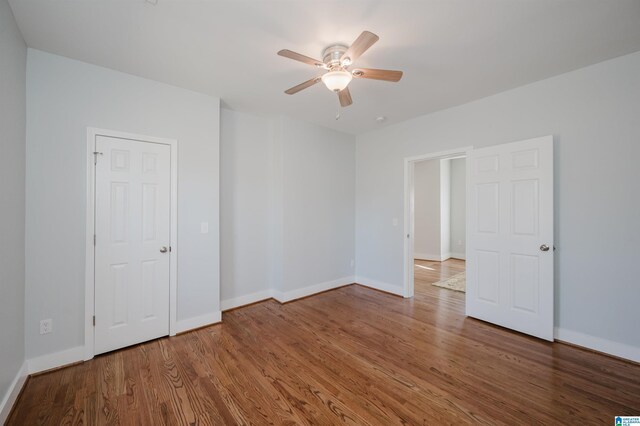 1330 14th Ave N, Bessemer, AL 35020 - unfurnished room with wood finished floors and a ceiling fan