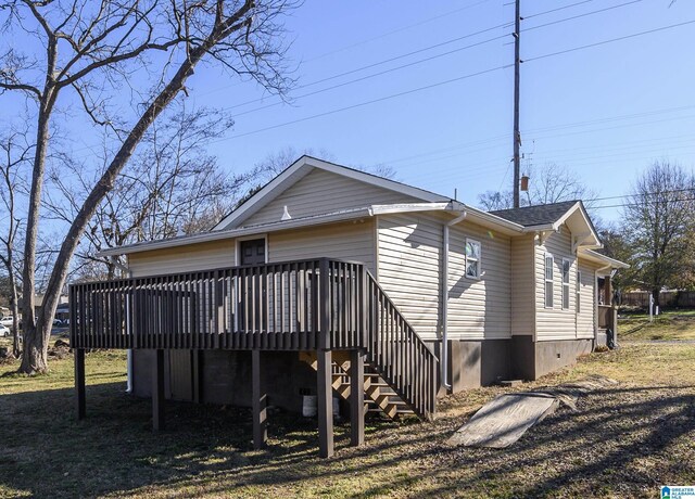 1330 14th Ave N, Bessemer, AL 35020 - back of house with a wooden deck, stairway, and crawl space