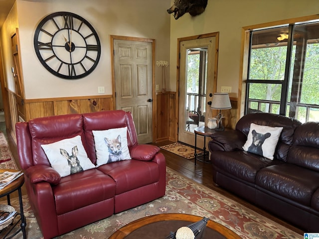 26718 Bridge Ln, Andalusia, AL 36421 - living room with wood finished floors, a wainscoted wall, and wooden walls