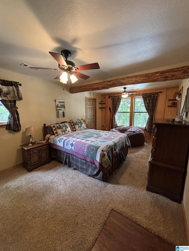 26718 Bridge Ln, Andalusia, AL 36421 - carpeted bedroom featuring a textured ceiling and ceiling fan