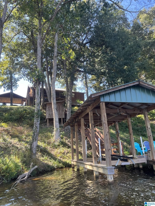 26718 Bridge Ln, Andalusia, AL 36421 - dock featuring boat lift and a water view