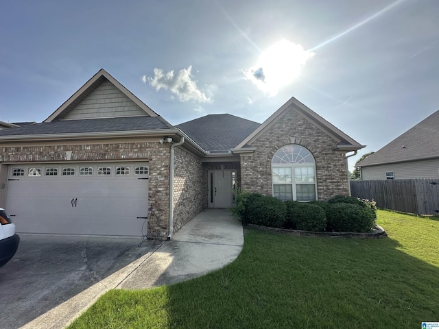 2007 Discovery Dr, Montevallo, AL 35115 - ranch-style house featuring a garage, brick siding, driveway, and roof with shingles
