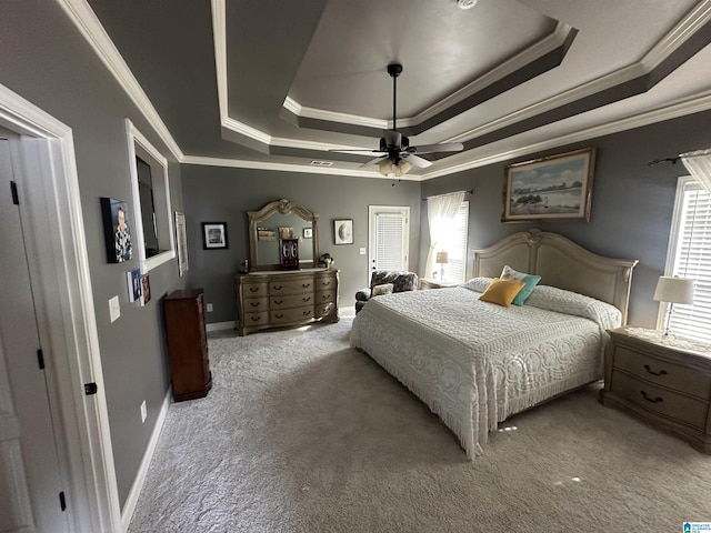 2007 Discovery Dr, Montevallo, AL 35115 - bedroom with a tray ceiling, carpet floors, ornamental molding, multiple windows, and a ceiling fan