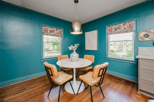 5100 7th Ct S, Birmingham, AL 35212 - dining area featuring wood finished floors and baseboards