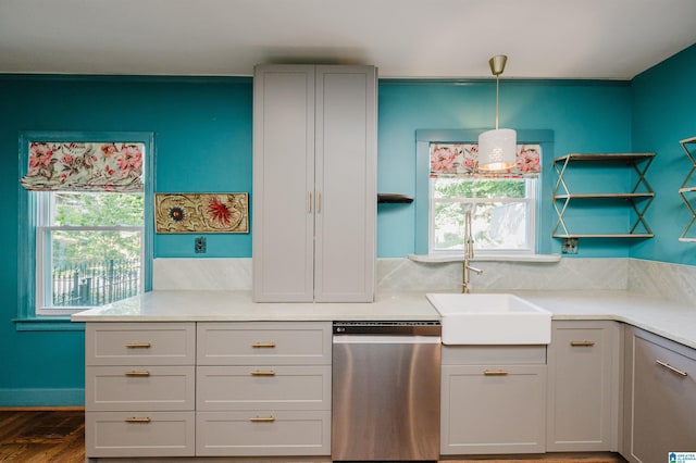 5100 7th Ct S, Birmingham, AL 35212 - kitchen with stainless steel dishwasher, open shelves, light countertops, and pendant lighting