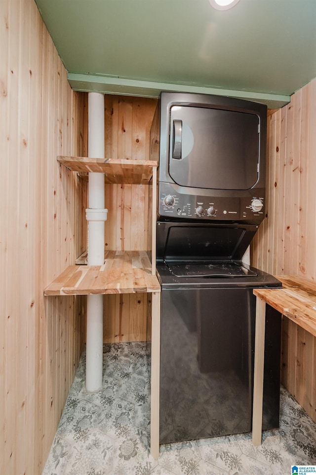 5100 7th Ct S, Birmingham, AL 35212 - laundry area with stacked washer and clothes dryer and wooden walls