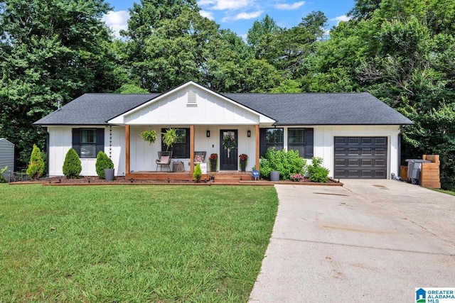 6400 Glenview Cir, Gardendale, AL 35071 - view of front of home featuring a porch, driveway, a garage, a front lawn, and a shingled roof