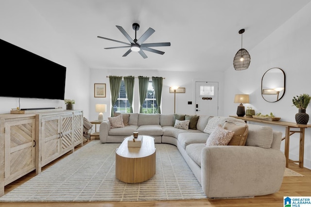6400 Glenview Cir, Gardendale, AL 35071 - living area with a ceiling fan, vaulted ceiling, and wood finished floors