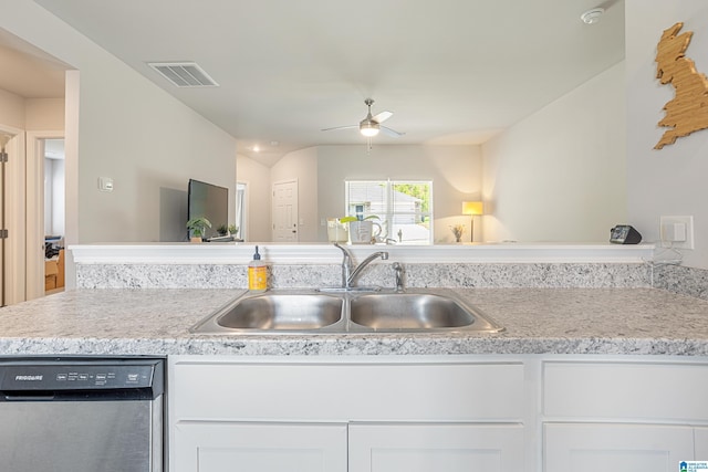 8681 Mohring Pl, Leeds, AL 35094 - kitchen with stainless steel dishwasher, a ceiling fan, and white cabinetry