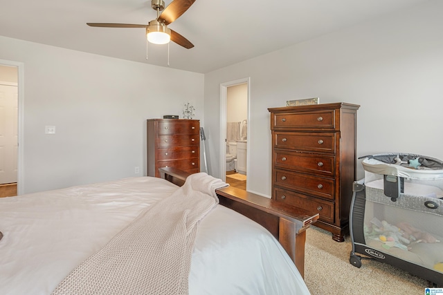 8681 Mohring Pl, Leeds, AL 35094 - bedroom with connected bathroom, ceiling fan, and carpet