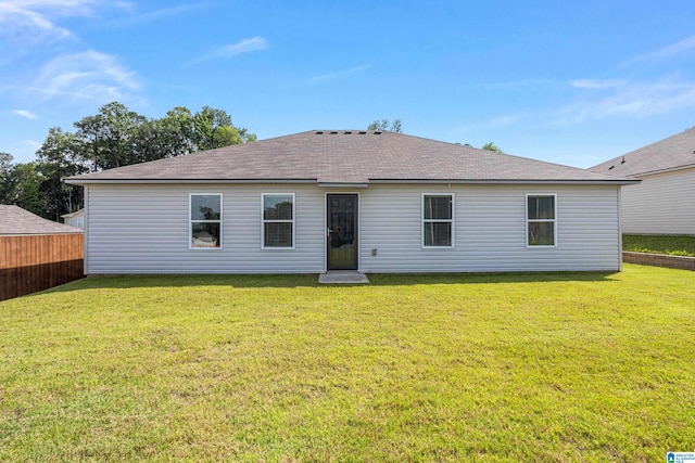 8681 Mohring Pl, Leeds, AL 35094 - rear view of property featuring a lawn and a shingled roof
