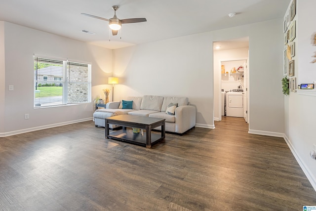 8681 Mohring Pl, Leeds, AL 35094 - living room with washer / clothes dryer, a ceiling fan, and dark wood-style floors