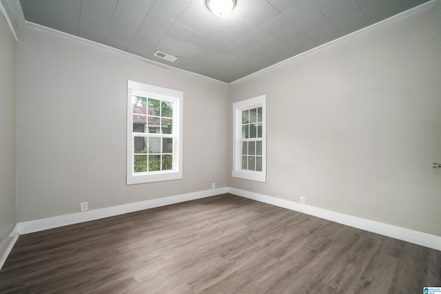 2129 Pike Rd, Birmingham, AL 35218 - unfurnished room with wood finished floors and ornamental molding