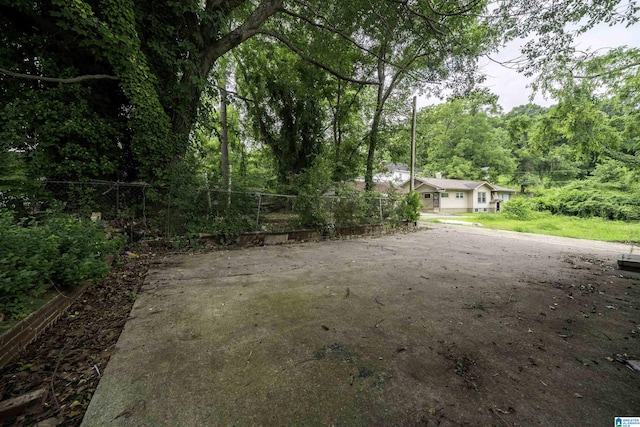 2129 Pike Rd, Birmingham, AL 35218 - view of yard with a view of trees