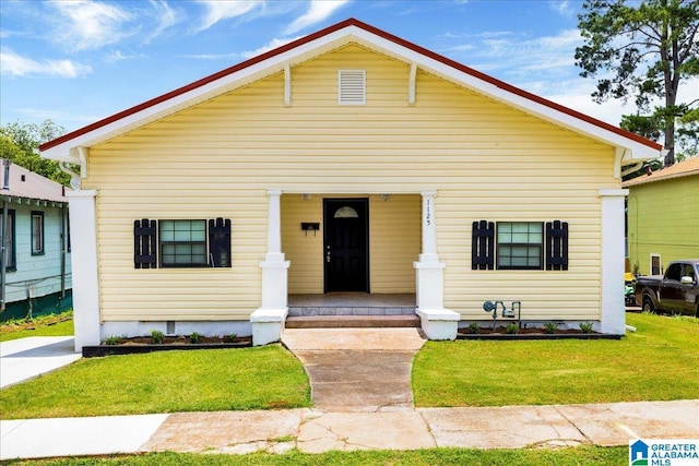 1125 SW 15th St, Birmingham, AL 35211 - view of front facade featuring a porch and a front lawn