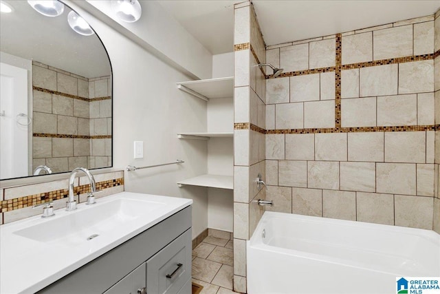 1125 SW 15th St, Birmingham, AL 35211 - full bathroom with vanity,  shower combination, tasteful backsplash, and tile patterned flooring