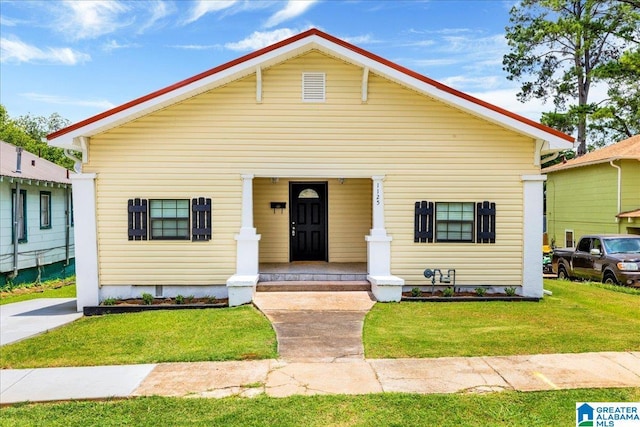 1125 SW 15th St, Birmingham, AL 35211 - view of front of house featuring a porch and a front yard