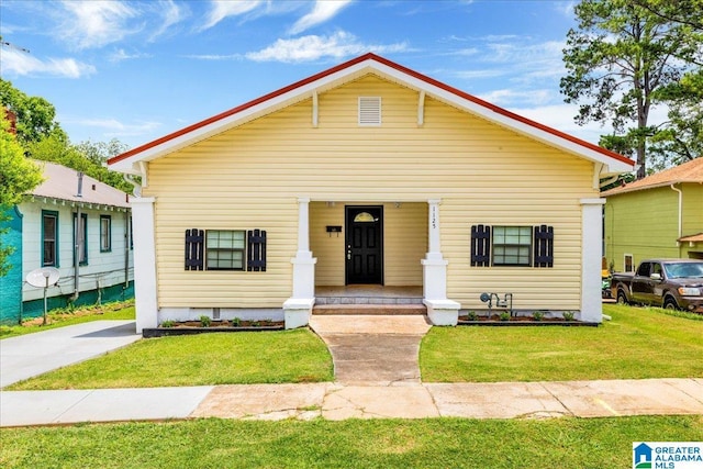 1125 SW 15th St, Birmingham, AL 35211 - view of front of home with a porch and a front lawn