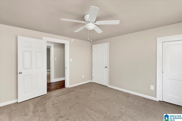 1125 SW 15th St, Birmingham, AL 35211 - unfurnished bedroom with carpet floors and a ceiling fan