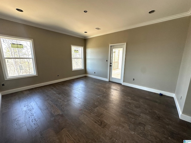 7733 Springer Rd, Mccalla, AL 35111 - unfurnished room featuring ornamental molding and dark wood-type flooring