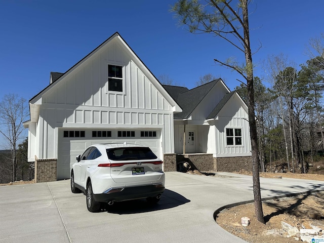 7733 Springer Rd, Mccalla, AL 35111 - modern farmhouse with board and batten siding, driveway, and brick siding