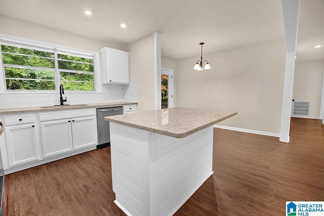 532 Hickory St, Birmingham, AL 35206 - kitchen with dishwasher, dark wood-type flooring, white cabinetry, light stone counters, and recessed lighting