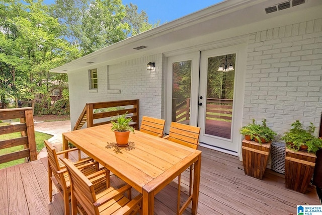 532 Hickory St, Birmingham, AL 35206 - wooden terrace with outdoor dining area