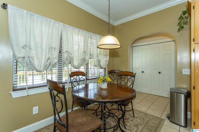 8587 Hayes Rd, Helena, AL 35022 - dining space with crown molding, healthy amount of natural light, and light tile patterned floors