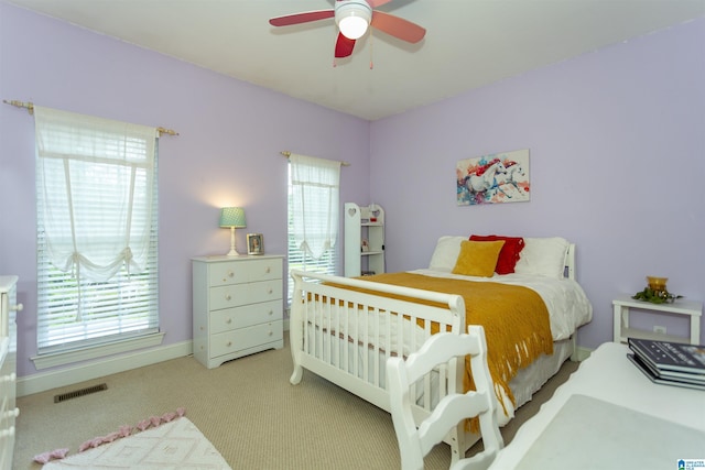 8587 Hayes Rd, Helena, AL 35022 - carpeted bedroom featuring a ceiling fan and baseboards