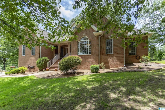 8587 Hayes Rd, Helena, AL 35022 - traditional-style home with a front yard and brick siding