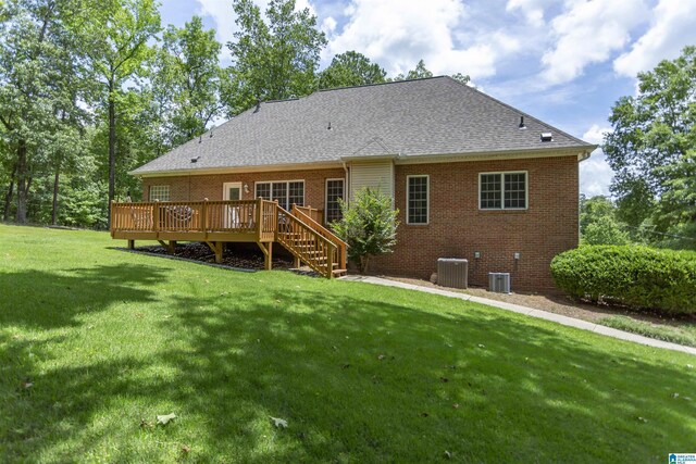 8587 Hayes Rd, Helena, AL 35022 - rear view of property with a deck, brick siding, a lawn, and a shingled roof
