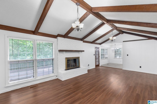 2005 Crossvine Rd, Hoover, AL 35244 - unfurnished living room with a chandelier, a fireplace, and wood finished floors