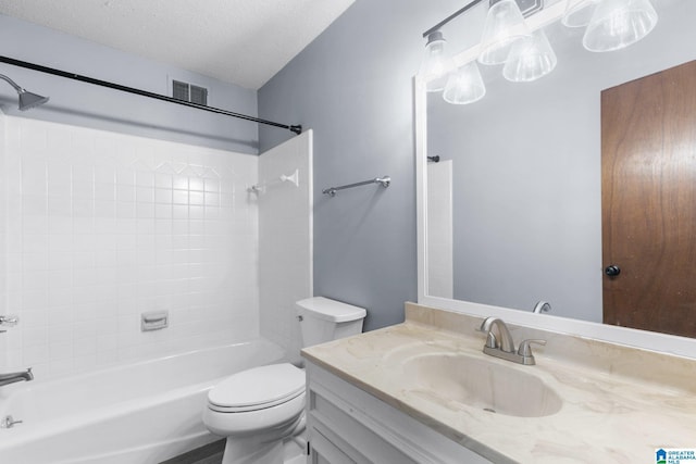 2005 Crossvine Rd, Hoover, AL 35244 - bathroom featuring vanity, tub / shower combination, and a textured ceiling