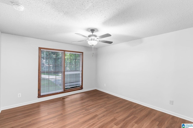 2005 Crossvine Rd, Hoover, AL 35244 - unfurnished room with wood finished floors, a textured ceiling, a smoke detector, and a ceiling fan