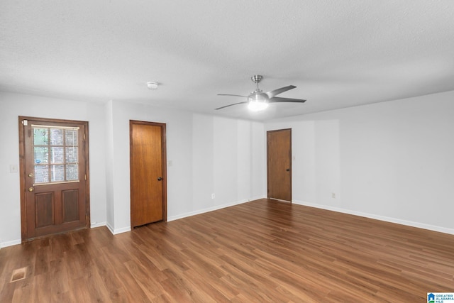 2005 Crossvine Rd, Hoover, AL 35244 - spare room featuring wood finished floors, a ceiling fan, a smoke detector, and a textured ceiling