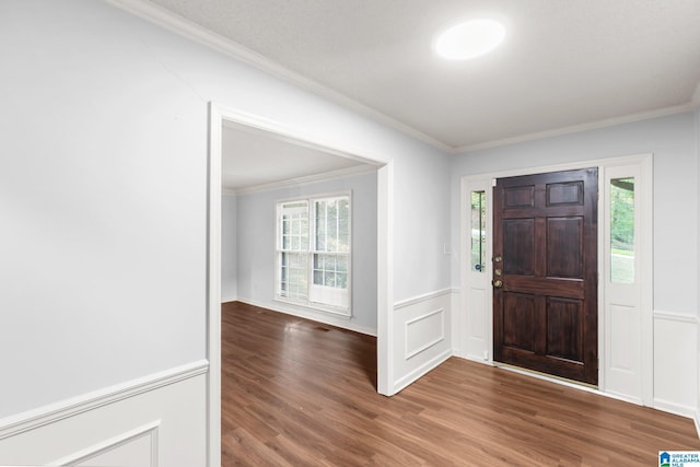 2005 Crossvine Rd, Hoover, AL 35244 - foyer entrance featuring ornamental molding, wood finished floors, and wainscoting