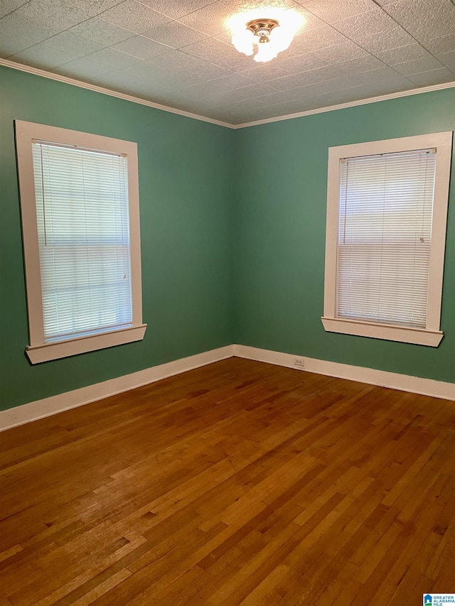 3185 Loblolly Ln, Birmingham, AL 35224 - empty room with wood finished floors and crown molding