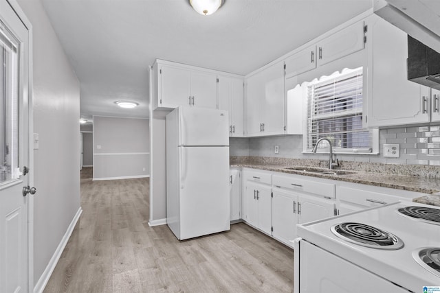 4 Carriage Rd, Anniston, AL 36206 - kitchen featuring white appliances, light wood finished floors, white cabinetry, and light stone counters