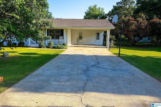 4 Carriage Rd, Anniston, AL 36206 - view of front of house featuring concrete driveway, a front lawn, and an attached carport
