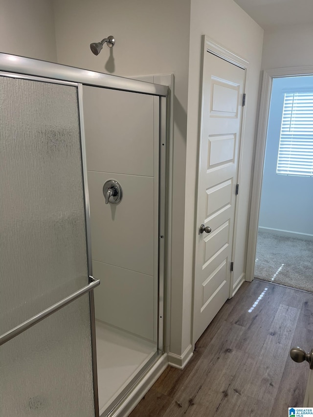 6534 Creek Cir, Helena, AL 35022 - bathroom featuring wood finished floors and a shower stall