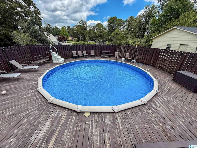 1027 Creek Trl, Anniston, AL 36206 - view of swimming pool featuring a deck and view of scattered trees