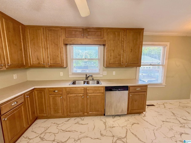 1027 Creek Trl, Anniston, AL 36206 - kitchen featuring dishwasher, brown cabinetry, and crown molding