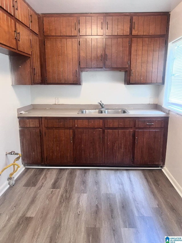 1641 17th Pl SW, Birmingham, AL 35211 - kitchen with dark wood-style flooring and light countertops