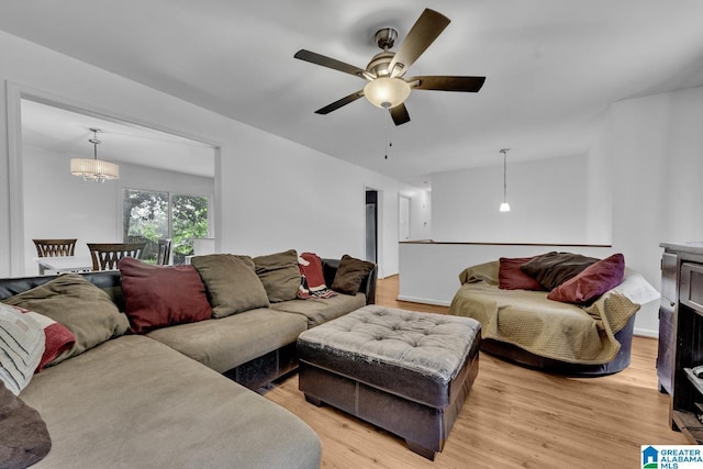 509 Lasalle Ln, Irondale, AL 35210 - living room with light wood-style flooring, ceiling fan, and a chandelier