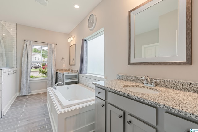4486 Old Cahaba Pkwy, Helena, AL 35080 - bathroom featuring a whirlpool tub, two vanities, and recessed lighting