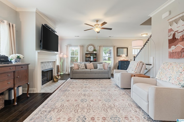 4486 Old Cahaba Pkwy, Helena, AL 35080 - living room featuring a ceiling fan, wood finished floors, a tile fireplace, and ornamental molding